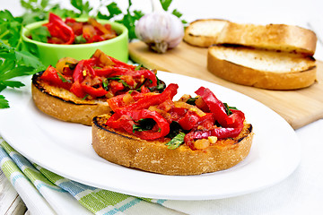 Image showing Bruschetta with vegetables in plate on light board