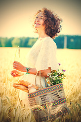 Image showing beautiful middle aged woman with bag