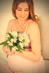 Image showing pregnant woman with flowers