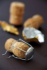 Image showing champagne corks on black background