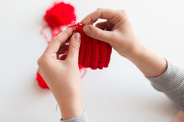 Image showing woman hands knitting with needles and yarn