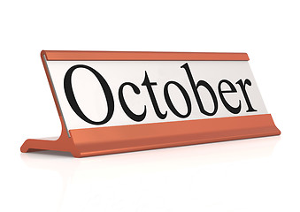 Image showing October word on table tag isolated 