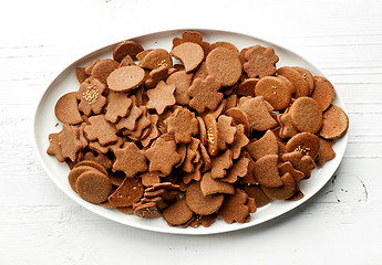 Image showing freshly baked gingerbreads on white plate