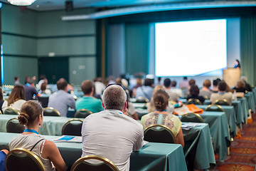 Image showing Audience in lecture hall participating at scientific conference.