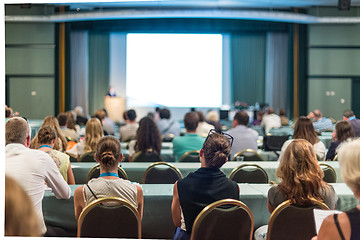 Image showing Audience in lecture hall participating at business conference.