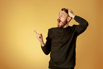 Image showing Portrait of young man with shocked facial expression