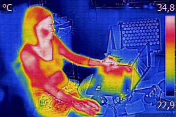 Image showing Infrared thermography image showing the heat emission when woman