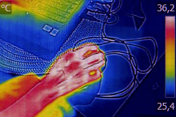 Image showing Infrared image showing the heat emission when woman used noteboo