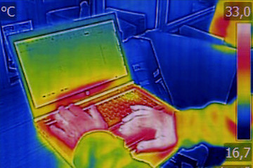 Image showing Infrared thermography image showing the heat emission when man u