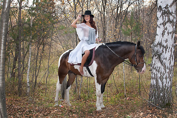 Image showing Young Woman And Horse