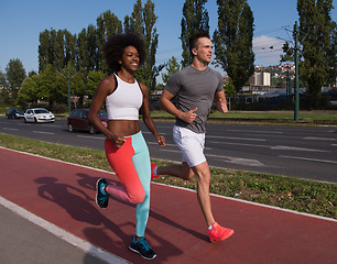 Image showing multiethnic group of people on the jogging