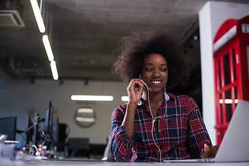 Image showing portrait of a young successful African-American woman in modern 