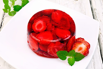 Image showing Jelly strawberry with mint on board