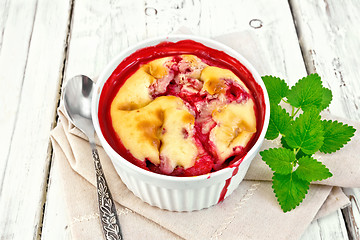 Image showing Pudding strawberry in bowl on light board