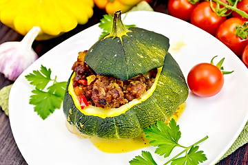 Image showing Squash green stuffed on dark board