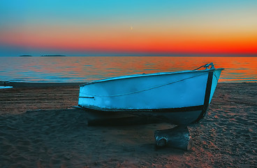 Image showing Blue Boat On The Beach At Sunset 