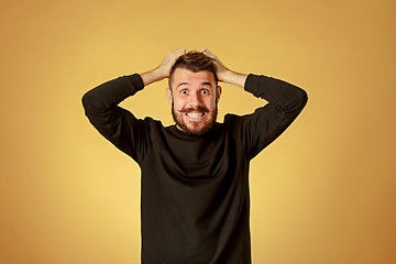 Image showing Portrait of young man with shocked facial expression