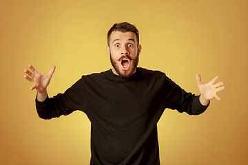 Image showing Portrait of young man with shocked facial expression