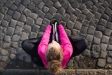 Image showing woman  stretching before morning jogging