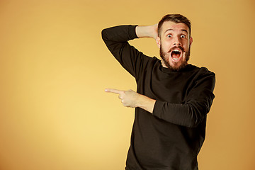 Image showing Portrait of young man with shocked facial expression