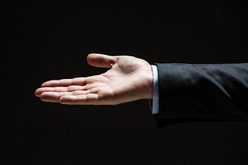 Image showing close up of businessman with empty hand