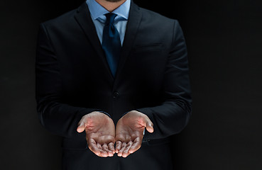 Image showing close up of businessman with empty hands