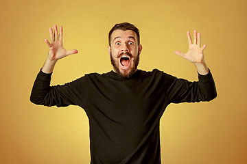 Image showing Portrait of young man with shocked facial expression