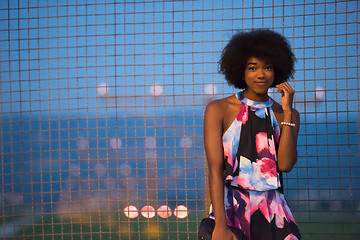 Image showing portrait of a young African-American woman in a summer dress