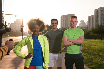 Image showing portrait multiethnic group of people on the jogging