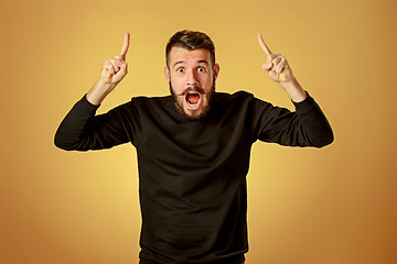 Image showing Portrait of young man with shocked facial expression