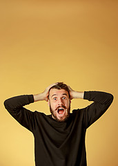 Image showing Portrait of young man with shocked facial expression