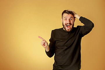 Image showing Portrait of young man with shocked facial expression