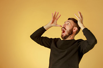 Image showing Portrait of young man with shocked facial expression