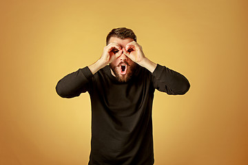 Image showing Portrait of young man with shocked facial expression