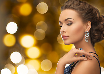 Image showing woman in evening dress and diamond earring