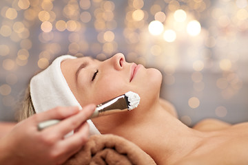 Image showing close up of young woman and cosmetologist in spa