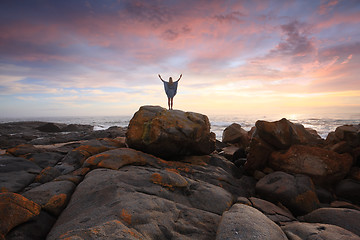 Image showing Rocky Landscape and Ocean at Sunrise