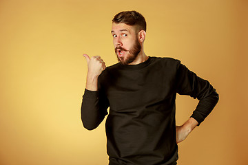 Image showing Portrait of young man with shocked facial expression