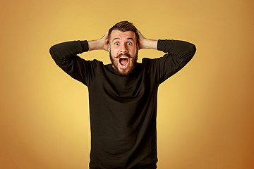 Image showing Portrait of young man with shocked facial expression