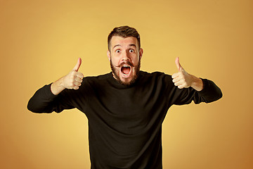 Image showing Portrait of young man with shocked facial expression