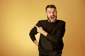 Image showing Portrait of young man with shocked facial expression