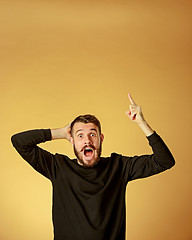 Image showing Portrait of young man with shocked facial expression