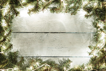 Image showing Wooden background with Christmas decoration for your design needs