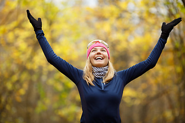 Image showing Smiling girl background of landscape