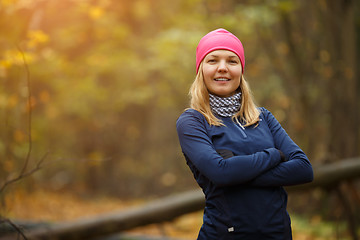 Image showing Sport girl in autumn forest