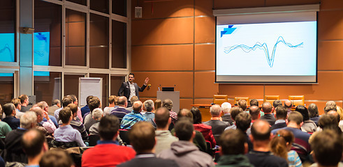 Image showing Business speaker giving a talk in conference hall.