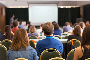 Image showing Audience in lecture hall participating at business conference.