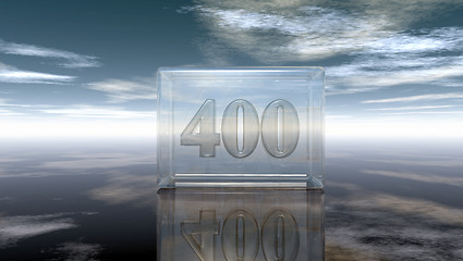 Image showing number four hundred in glass cube under cloudy sky - 3d rendering