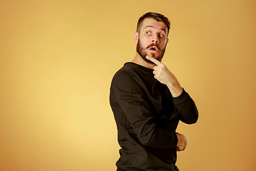 Image showing Portrait of young man with shocked facial expression