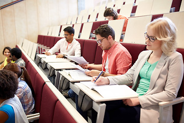 Image showing group of students writing test at lecture hall